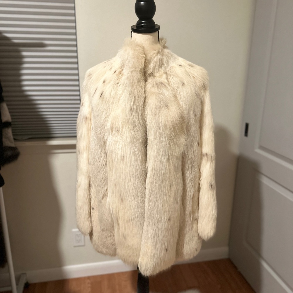 Elegant cream spotted fox fur coat